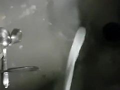 Heavy cummer unloads in a sink