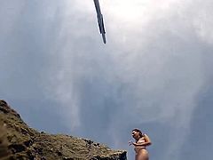 guy with underwater cam follows around women on nudist beach