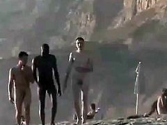 THREE NUDE MEN AT BEACH WITH NICE ERECTIONS