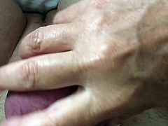 Girlfriend squeezing Boyfriend's Balls