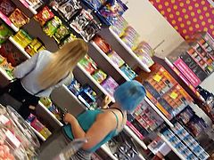 Candid voyeur tight black jeans teen in candy store