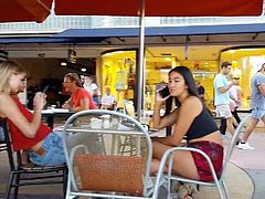 Candid voyeur hottie sitting with friend great legs