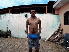 Brazilian men showing bulge at his blue underwear