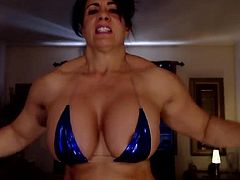 muscle woman with big fake boobs
