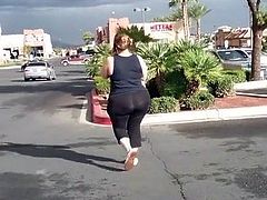 Fat butt walking to her car.