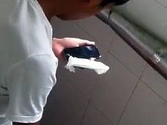 Asian boy looks porn and jerk off and cum