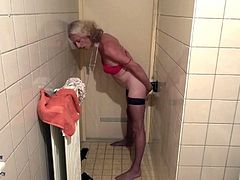 Kitty riding her dildo in the bathroom