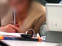 Busty young woman studying (part 1)