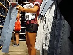 Candid voyeur teen tight shiny shorts shopping