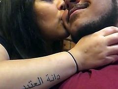 arabian couple kissing in public