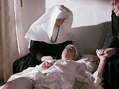 Sinfully beautiful babe Charlotte Stokely gets intimate with two sex-starved nuns