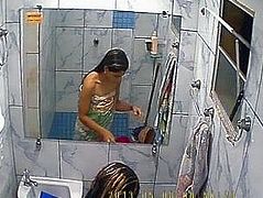Big titted Brazilian takes a shower