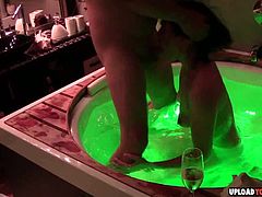 Lucky guy gets to plow his wife in a glowing hot tub in various positions.