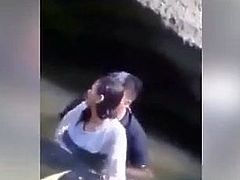 couple do romance in a river.mp4