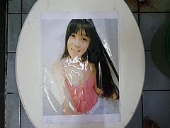 pissing on printed pic #2