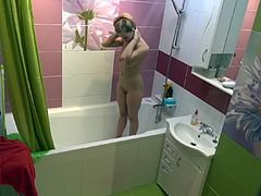 Naked chick with big tits in the shower