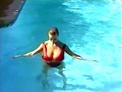 Tiffany Towers relaxing in  a pool before fucking