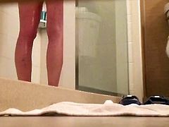 Unaware wife in hotel shower