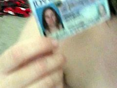 Exposed whore holds up ID while sucking cock
