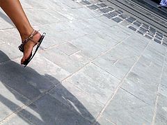 candid girl tan legs, feet, white shorts, sandals,walking