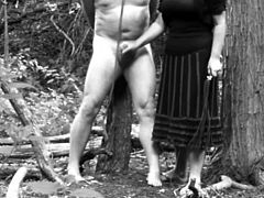 Femdom Slave Tied to a Tree In The Woods By His Mistress