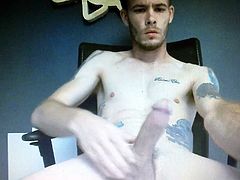 Sexy tattooed straight guy films himself cuming huge dick
