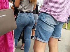 This hot teen is walking around the street in this amazing tight jeans showing her perfect round booty in candid footage