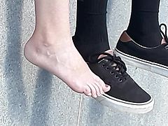 Cute little blonde bombshell barefoot