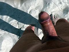 Hard and nude at public beach