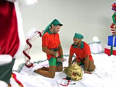 This is a Christmas story about how two naughty elves peeped into a Santa's bag without a demand and stole a very strange gift... It's amazing that these slutty guys know how to use this kinky sex toy. Watch how Santa will punish them after he discovers what they have done... Hot interracial threesome at its best!