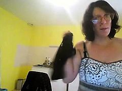 Mature toying herself on webcam