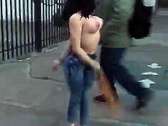 She strips in the street with people about