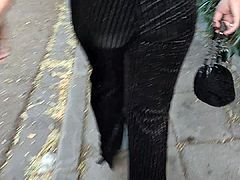 Sexy girl walks with her elegant wide-leg pants