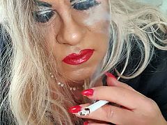 sultry tgirl smoking in red lipstick