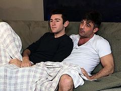 Stepdaddy caresses stepsons and feels his growing boner