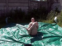 Outdoor bondage of American fetishist Caroline Pierce in hogtied creative rope works and strictly tied up kinky babe restrained