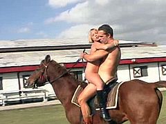 A rare scene featuring Sandy Knight having sex on horseback.