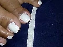 Closeup on Morenafeet's fingers with French nail polish 2