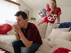 Watch this horny dude seduce his friend's daughter, who is a cheerleader. He eats her pussy out sneakily while his friend watches tv on the couch. The petite hottie demands more, so he gets up and puts her leg on the couch, and after having this risky fucking session, the blondie thanks her dad's friend with a blowie.