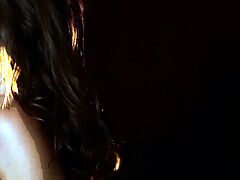 Glamorous hottie singing and stripping