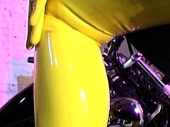 Latex lesbians pleasing their holes